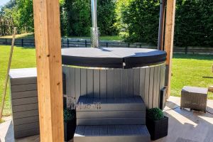Outdoor-whirlpool-hot-tub-with-Smart-pellet-stove-2